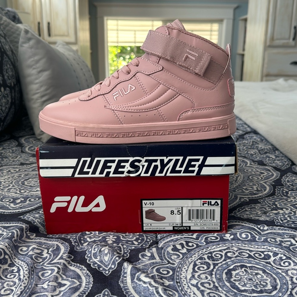 Fila high top sneakers. These have never been worn! Size 8.5